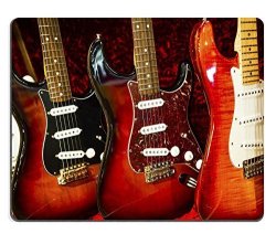 Luxlady Mousepad A Row Of Electric Guitar On Display With Red Velvet Backrground Image 21739734
