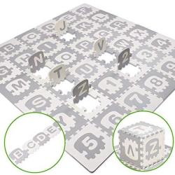 grey and white puzzle play mat