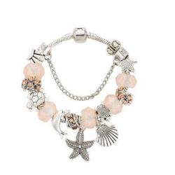 Charming Light Pink And Silver Bracelet With Ocean-life Themed Charms