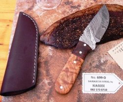 Damascus Steel Biltong Knife. Brass bone wood Leather Sheath. Was R 1950.00. Now Only R899.00