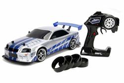 Jada 99701 Toys Fast Furious Brian S Nissan Skyline Gt R Bn34 Drift Power Slide Rc Radio Remote Control Toy Race Car With Extra Tires 1 10 Scale Silver Blue Reviews Online Pricecheck